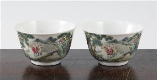 A pair of Chinese famille boys cups, Yongzheng marks, 18th/19th century, diameter 6.25cm, restored